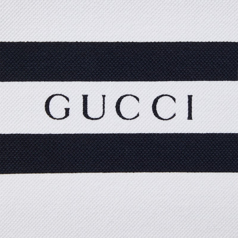 788016_XJGJX_9081_012_100_0000_Light-Cotton-polo-shirt-with-Gucci-print