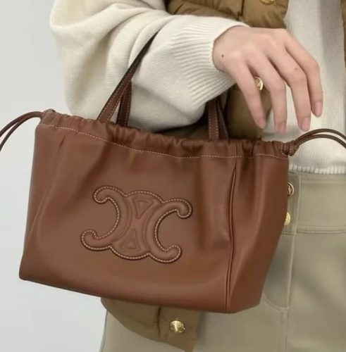 Click to view full screen Small Cabas Drawstring Cuir Triomphe In Smooth Calfskin photo review